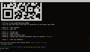 Expo development server showing a QR code in the terminal